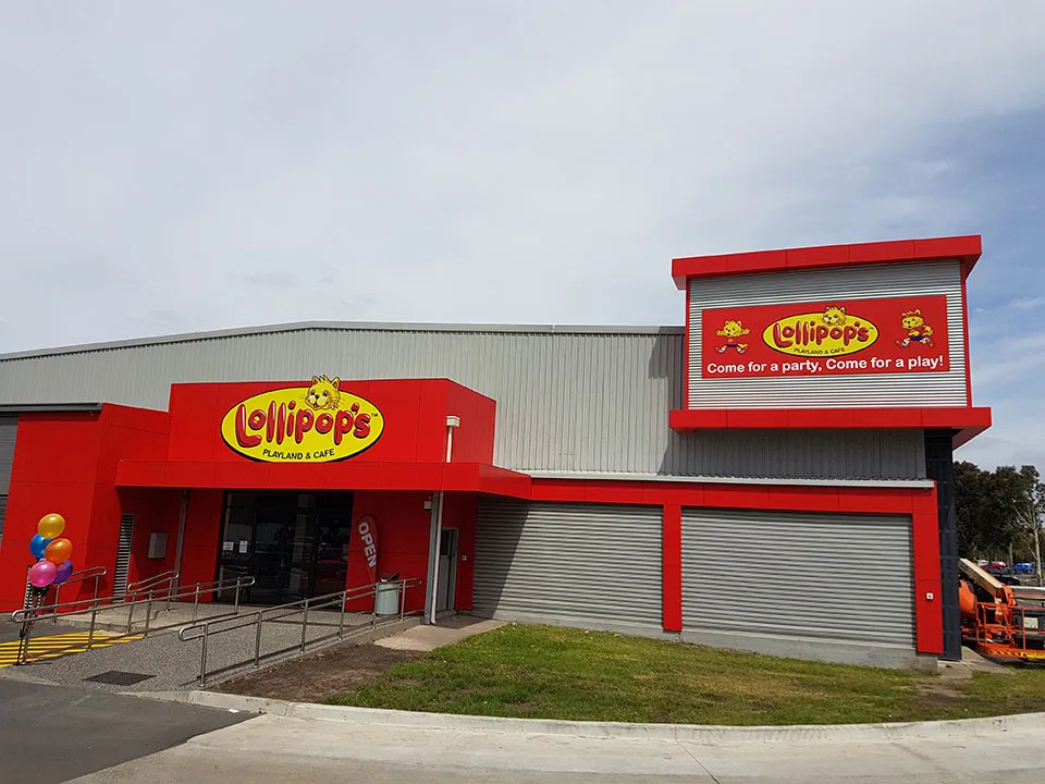 Lollipop's Factory Sign